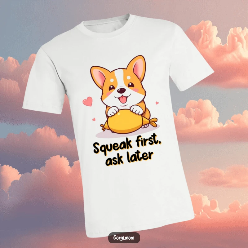Funny kawaii corgi mid-pounce on a squeaky toy, showcasing energetic and hilarious playtime on a t-shirt.